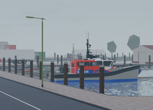 Boat docked at a pier with buildings and street signs in the background